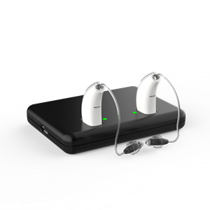 Starkey Hearing Technologies Mini Turbo Charger with two white Receiver-in-Canal hearing aids